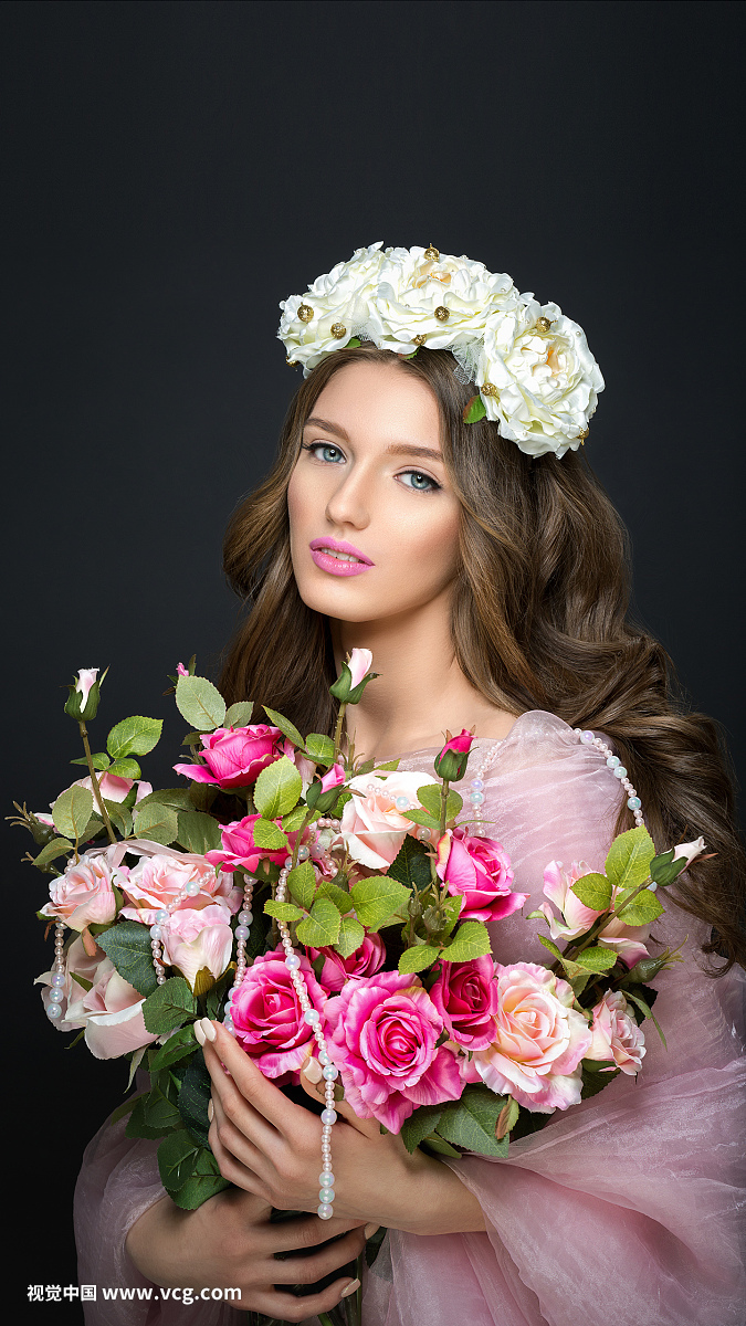 beautiful girl with pink makeup and flowers