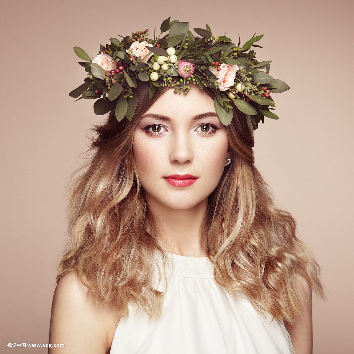 Beautiful blonde woman with flower wreath on her head