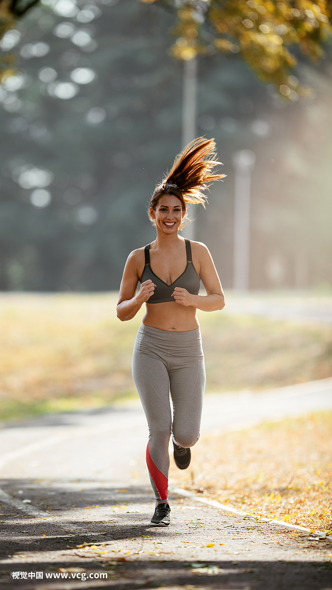 Young woman jogging in park