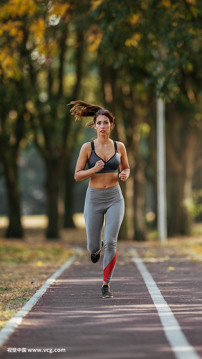 Young woman jogging in park